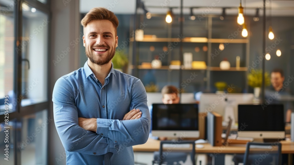 Portrait of young handsome smiling business guy wearing gray shirt and glasses, feeling confident with crossed arms, isolated on white background Portrait of young handsome smiling business guy wearing gray shirt and glasses, feeling confident with crossed arms, isolated on white background