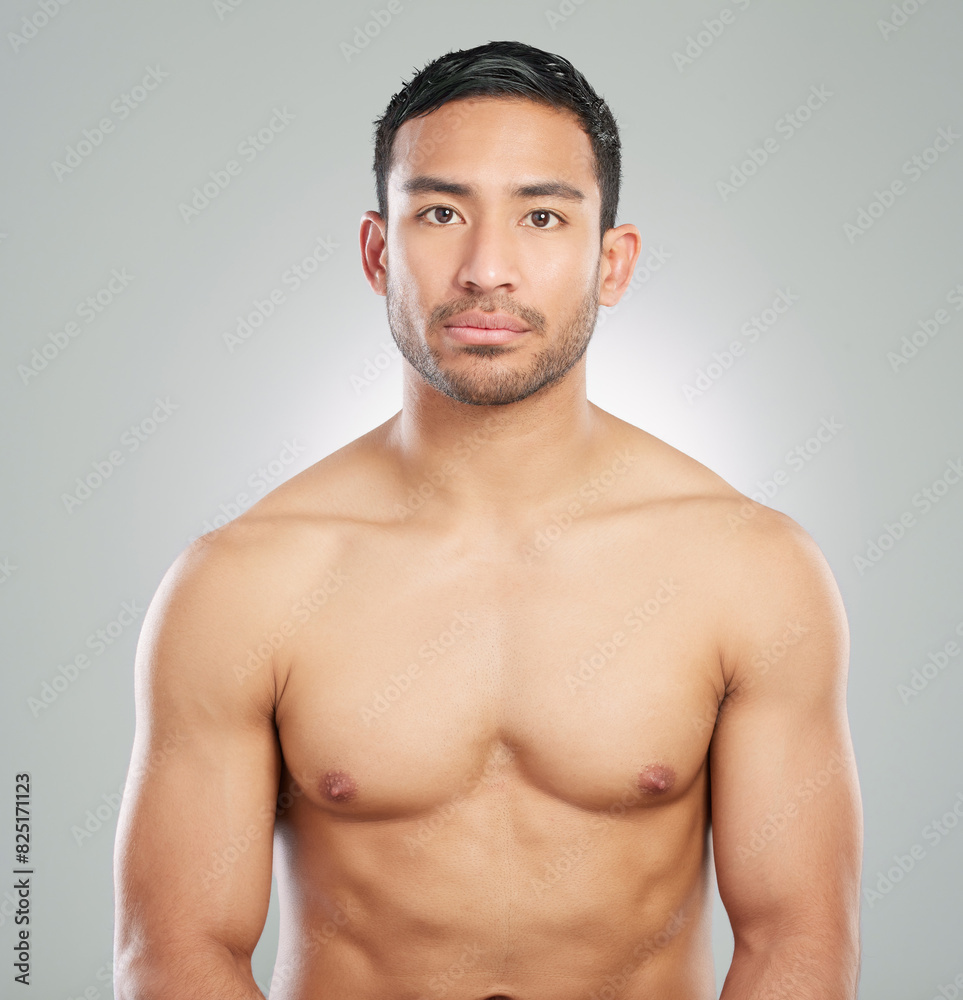 Portrait, muscle and man with skincare, beauty and dermatology on grey studio background. Person, model and guy with wellness, topless and confidence with cosmetics, fitness and grooming routine Portrait, muscle and man with skincare, beauty and dermatology on grey studio background. Person, model and guy with wellness, topless and confidence with cosmetics, fitness and grooming routine