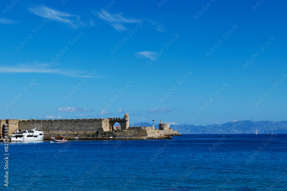 The Ancient walled city along the coastline of Rhodes, Greece, Europe The Ancient walled city along the coastline of Rhodes, Greece, Europe