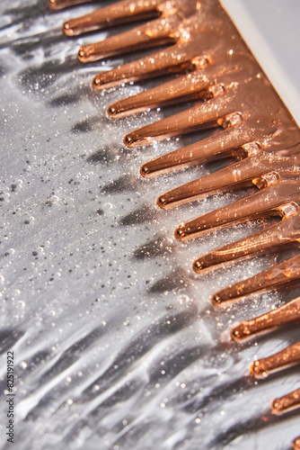 Golden hair comb in hair gel 