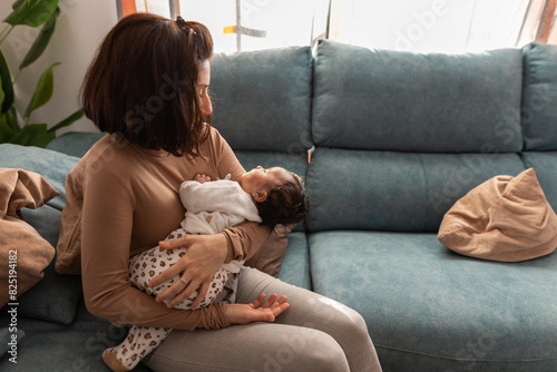 A MOTHER WITH HER NEWBORN BABY photo