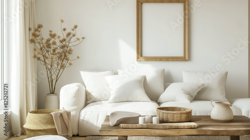 Mesa de centro rústica e cesta de vime perto do sofá branco contra a parede com moldura artística. Boho, design de interiores country de sala de estar moderna. photo