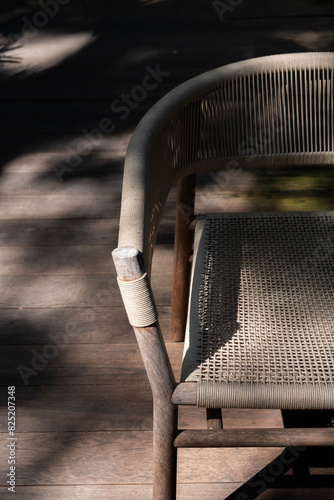 CLose up of rattan chair under sunlight photo