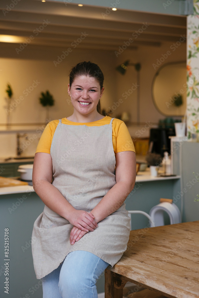 Cheerful pastry chef looking at camera Cheerful pastry chef looking at camera