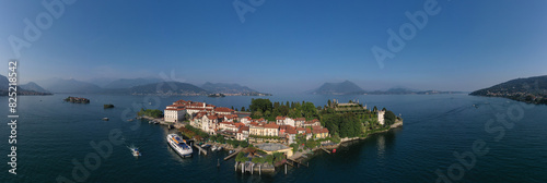 Aerial panoramic view of Isola Bella drone panoramic view. Panorama at sunset on Lake Maggiore top view. Borromean Islands, Lake Maggiore, Piedmont, Europe. Lake Maggiore, island, Isola Bella, Italy. photo