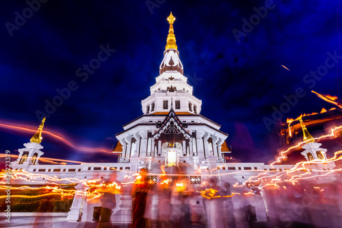 Fotografie Candlelight around Pagoda Wat Pa Ban Tat temple Udon Thani, Thailand