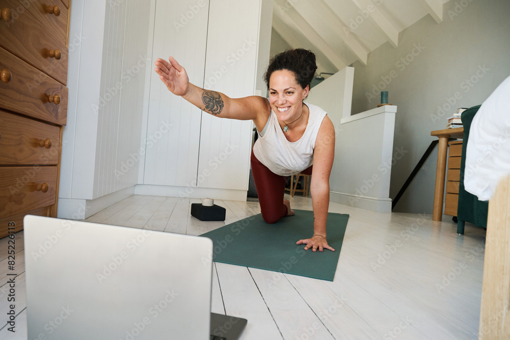 Smiling woman doing Balancing Table pose Smiling woman doing Balancing Table pose