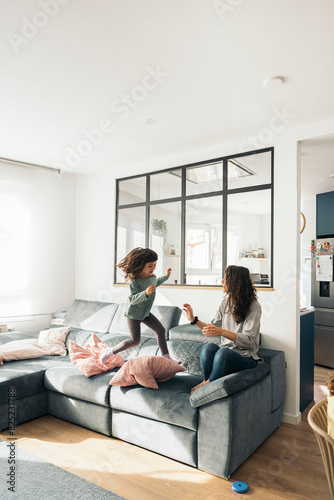 girl running with his mother