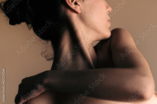Anonymous naked woman close up photo