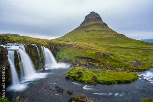 Kirkjufellsfoss Waterfall And Kirkjufell Mount   photo