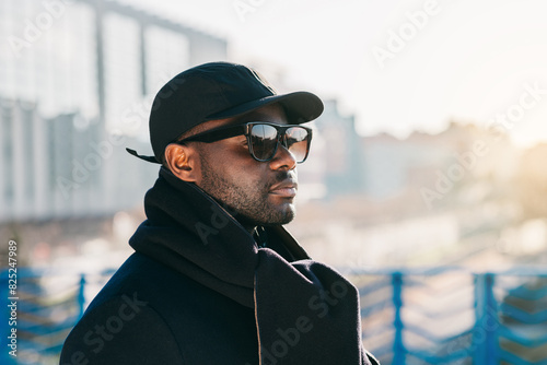 Stylish African American man in urban setting photo