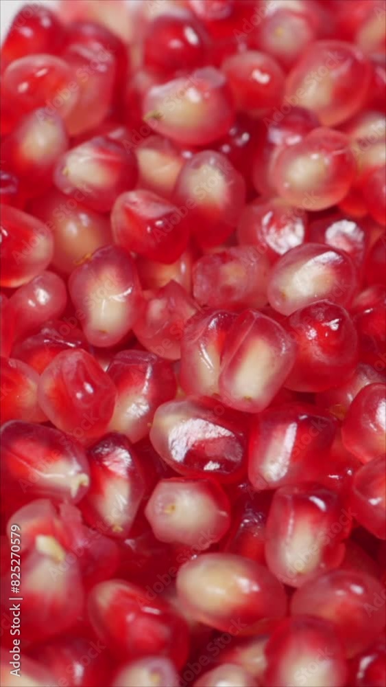 Rotating Pomegranate Seeds. Top View. Vertical.
Rotating Pomegranate Seeds. Top View. Vertical.