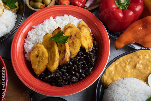 Black beans and white rice with fried plantains banana cuban venezuelan food