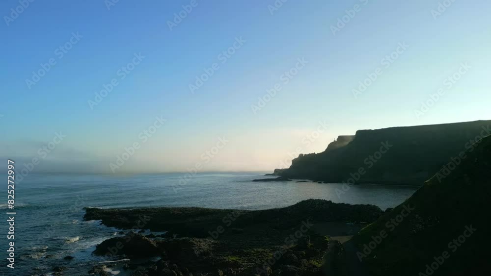 Aerial shot of the cliffs at Giant's Causeway in County Antrim, Northern Ireland on an summer morning.
The camera passes to the left.
Filmed in 4K, 50fps and in Rec709 color space. Aerial shot of the cliffs at Giant's Causeway in County Antrim, Northern Ireland on an summer morning.
The camera passes to the left.
Filmed in 4K, 50fps and in Rec709 color space.