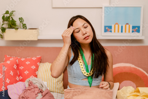 Woman Using Oil Blotting Paper 