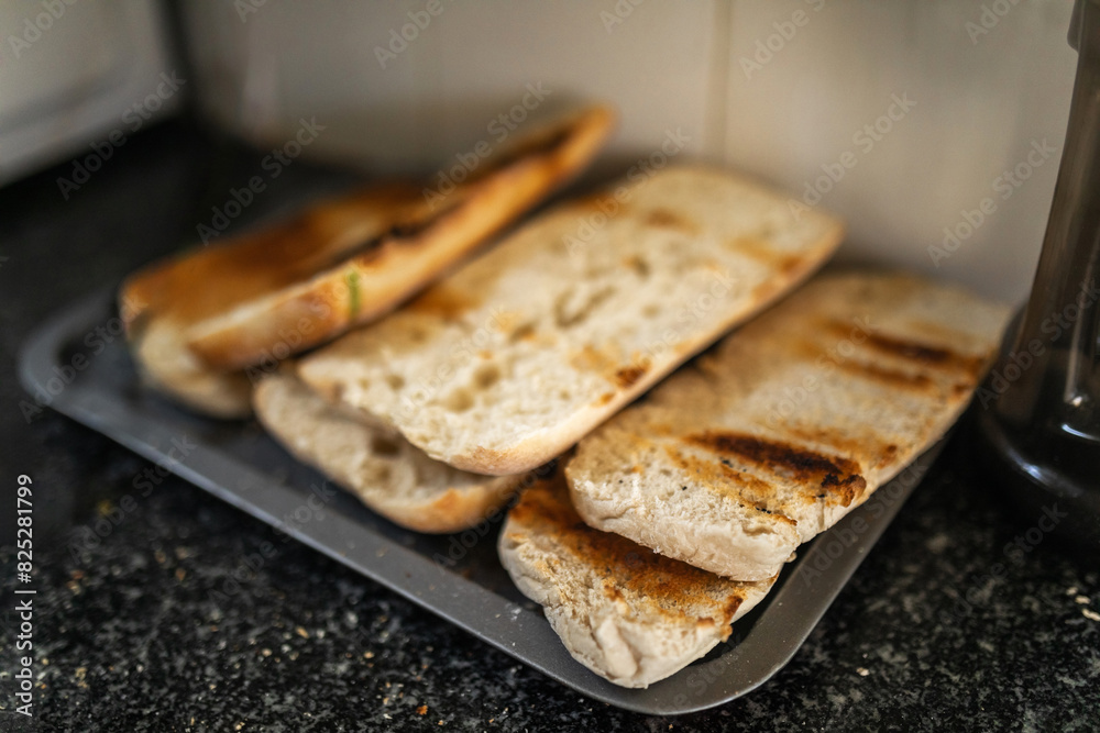 toasted bread in a restaurant kitchen toasted bread in a restaurant kitchen