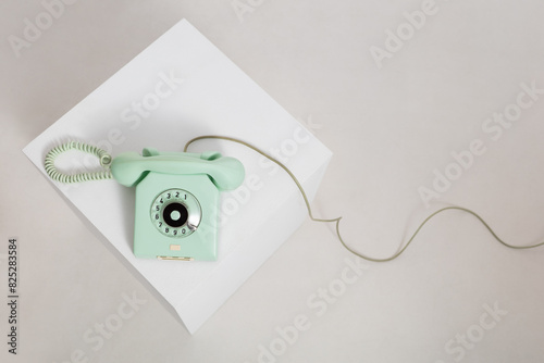 Top view at vintage mint colored rotary telephone photo