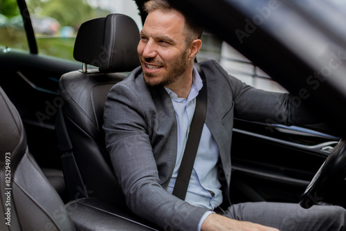 Businessman in suit parking...