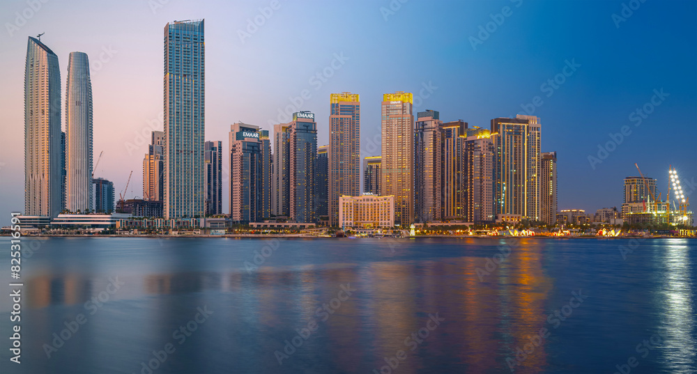 Fototapeta premium Dubai Towers Day and night