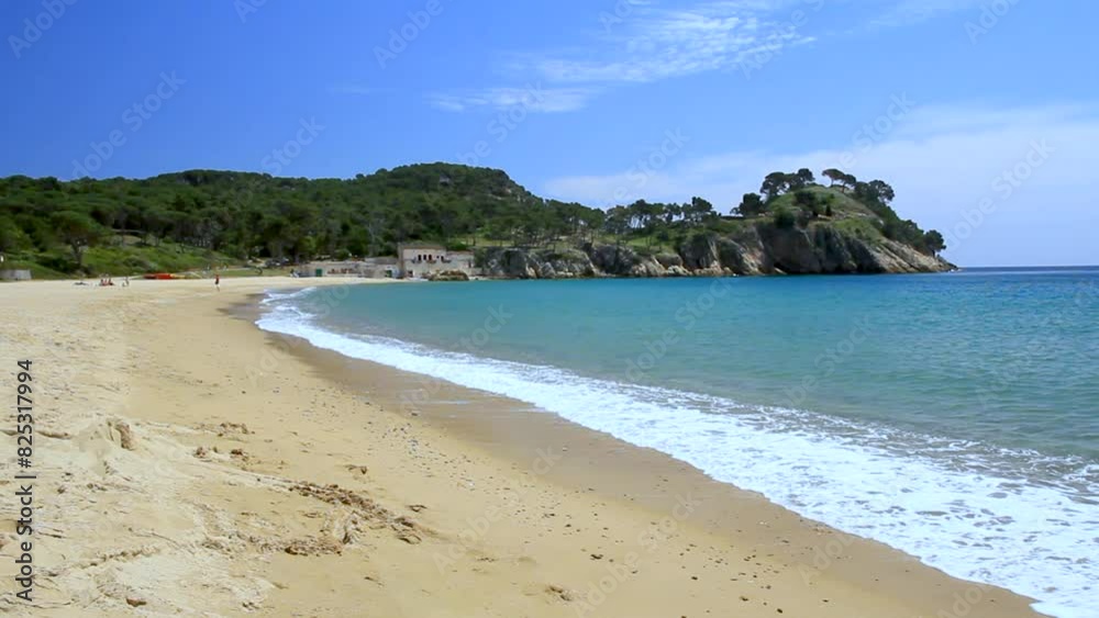 General view of Castell beach at ground level with the Mediterranean Sea. Palamos, Costa Brava, Catalunya, Spain. General view of Castell beach at ground level with the Mediterranean Sea. Palamos, Costa Brava, Catalunya, Spain.