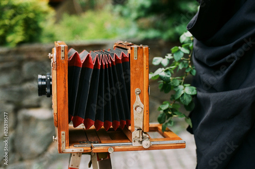 Vintage large format camera outdoors photo