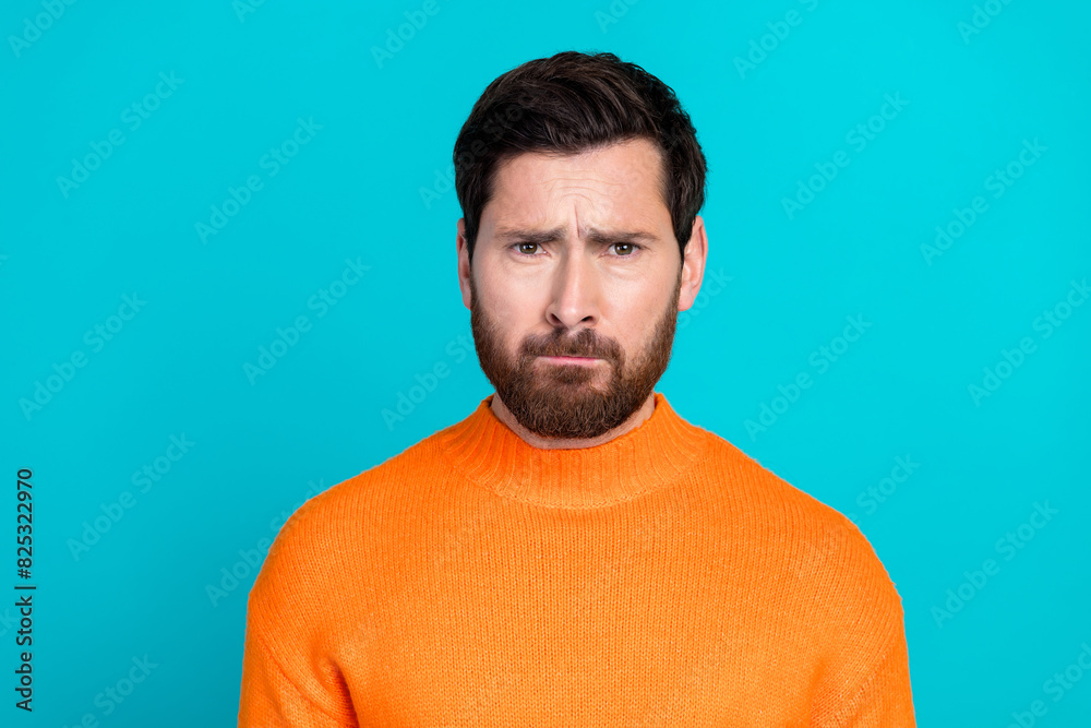 Photo of irritated annoyed young man wear orange stylish clothes isolated on cyan color background
