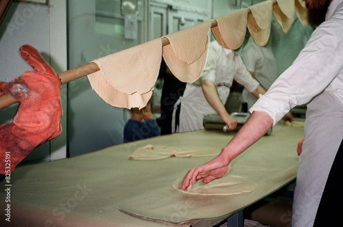 Artisanal Preparation Of Matzo For Passover. photo