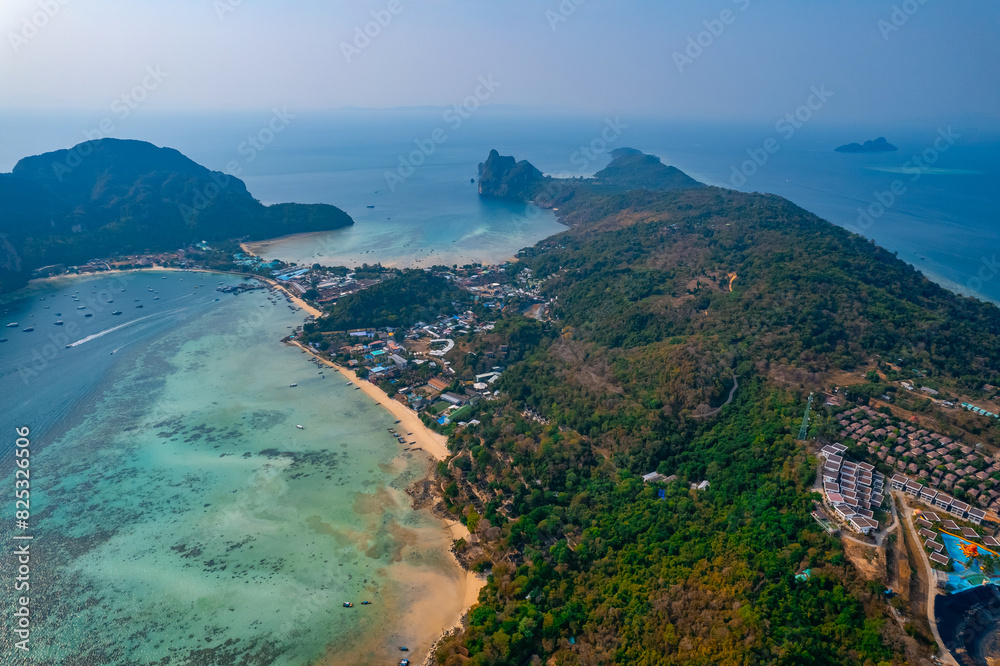 Fototapeta premium Aerial view landscape longtail boat on Phi Phi island from drone, travel landmark of Thailand