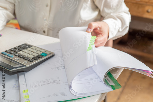 Accountant counts on a calculator