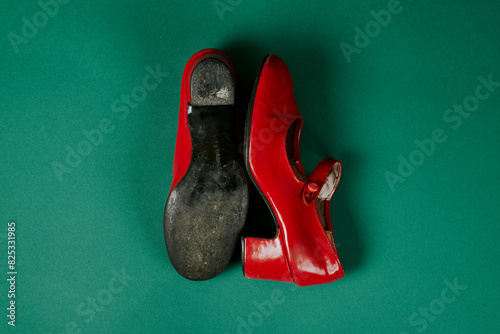 worn red flamenco shoes photo