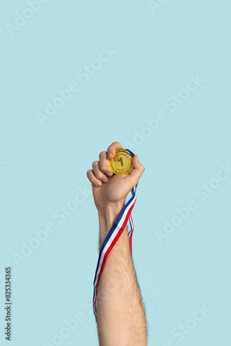 Person holding first prize gold medal. Success, competition, winner.