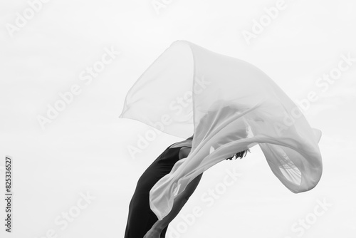 Abstract female dance on beach in sunrise