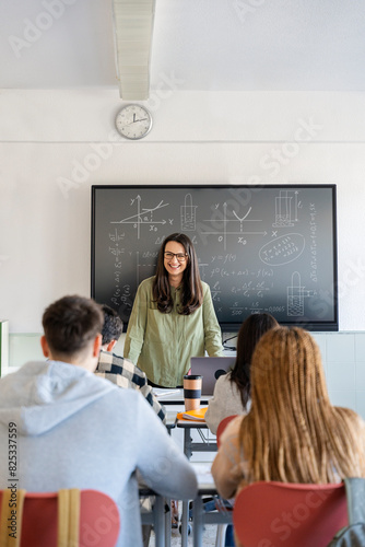 teacher teaching mathematics to the students