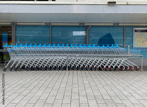 row of supermarket carts photo