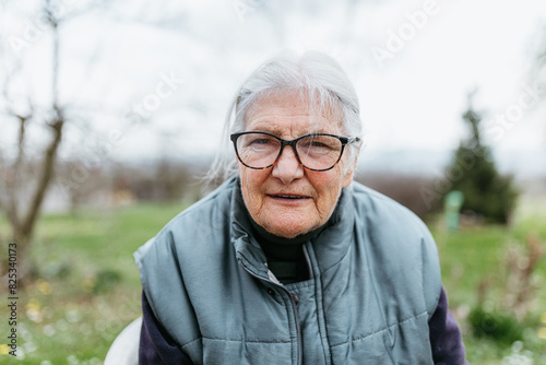 Elder Woman In The Yard photo