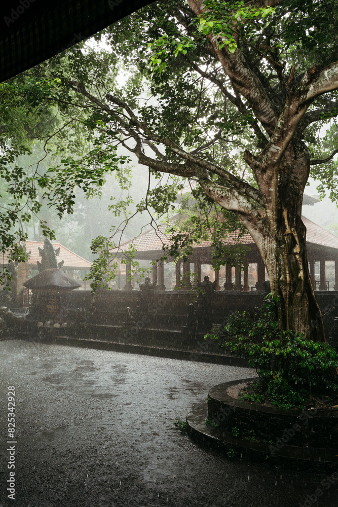 Rainy day in the traditional Balinese Buddhist temple courtyard Rainy day in the traditional Balinese Buddhist temple courtyard