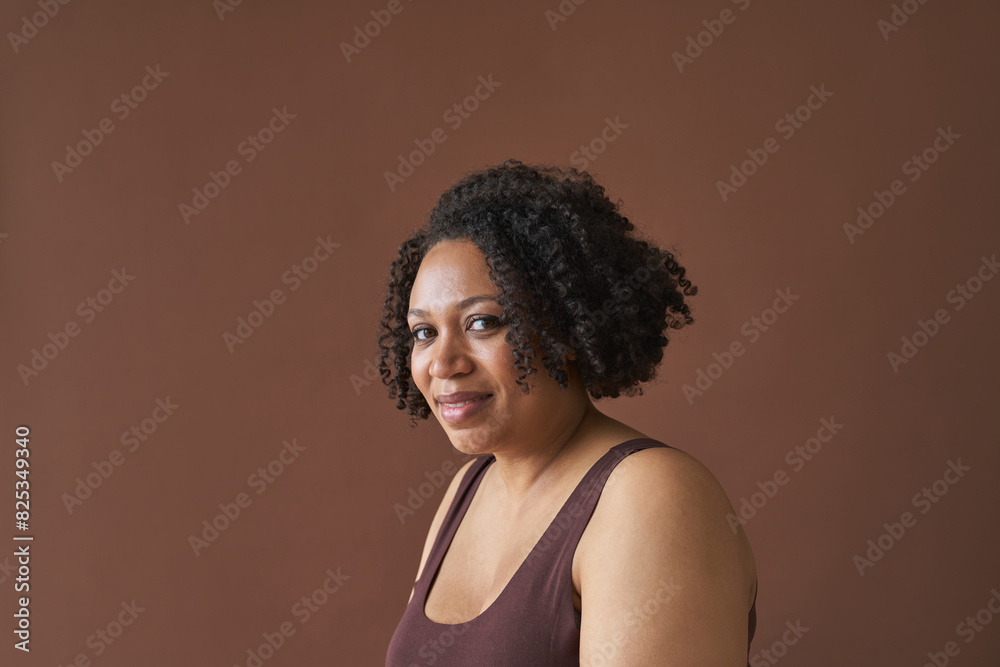 Side View of Smiling Woman with Curly Hair Side View of Smiling Woman with Curly Hair