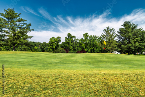 Golf Course Green with Red and Yellow Flag