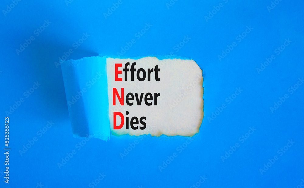END effort never dies symbol. Concept words END effort never dies on beautiful white paper. Beautiful blue paper background. Business END effort never dies concept. Copy space. END effort never dies symbol. Concept words END effort never dies on beautiful white paper. Beautiful blue paper background. Business END effort never dies concept. Copy space.