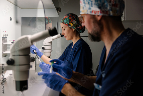 Medical professionals engaged in laboratory research