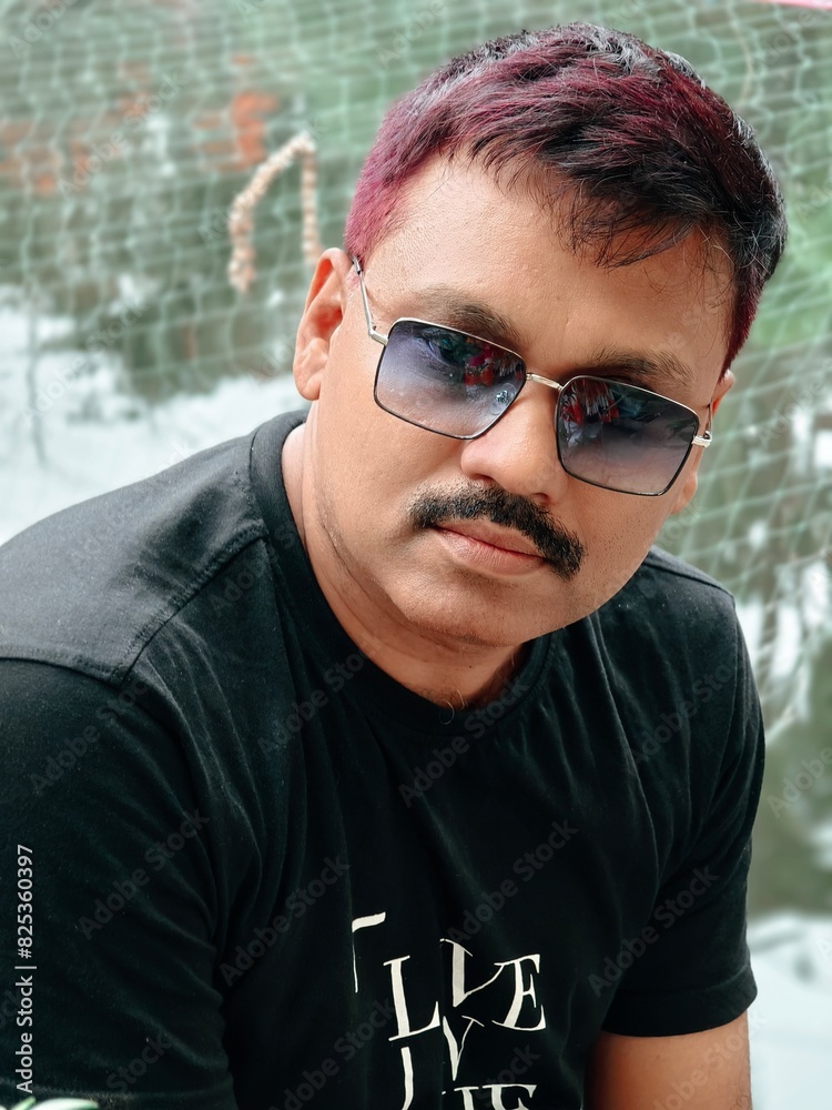 Portrait and facial expression of a middle aged Indian man Portrait and facial expression of a middle aged Indian man