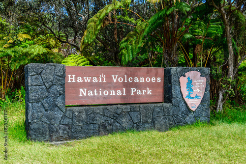 Wallpaper Mural Sign for Hawaii Volcanoes National Park in front of a vibrant green meadow. Torontodigital.ca