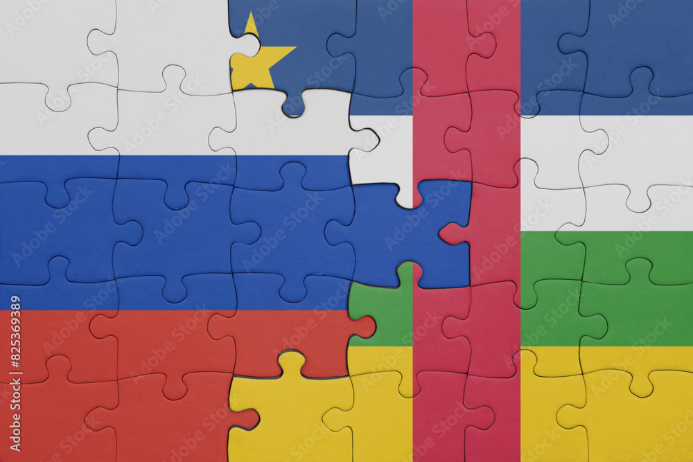 puzzle with the colourful national flag of central african republic and flag of russia. puzzle with the colourful national flag of central african republic and flag of russia.