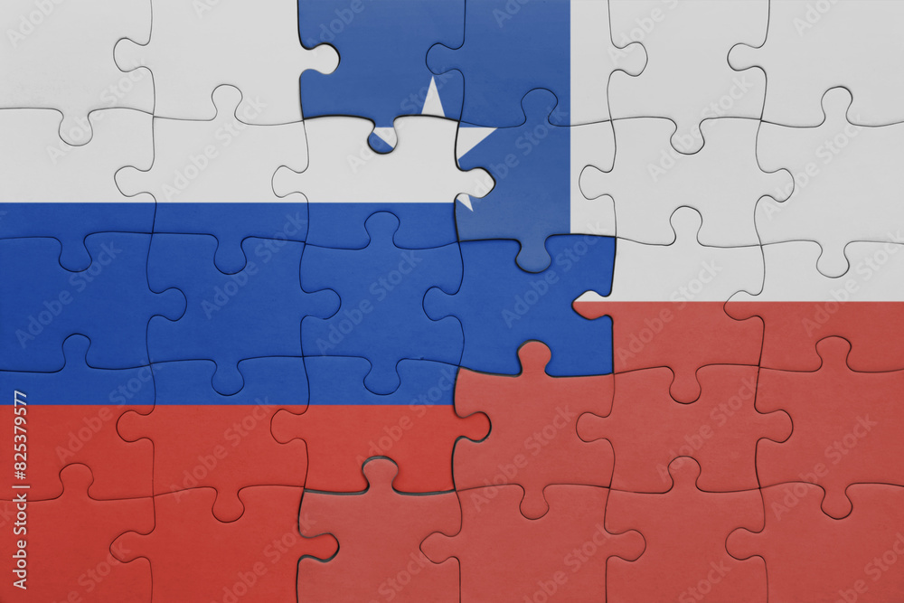 puzzle with the colourful national flag of chile and flag of russia. puzzle with the colourful national flag of chile and flag of russia.