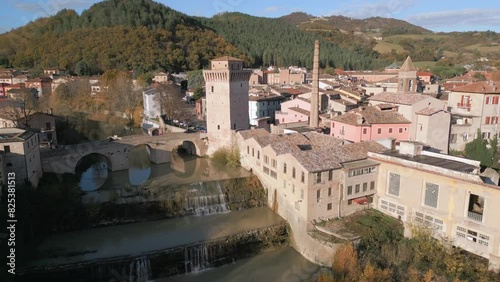 Aerial view of the village of Fermignano in the province of Pesaro and Urbino with mountain photo