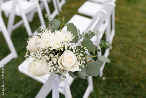 Flower in aisle at wedding