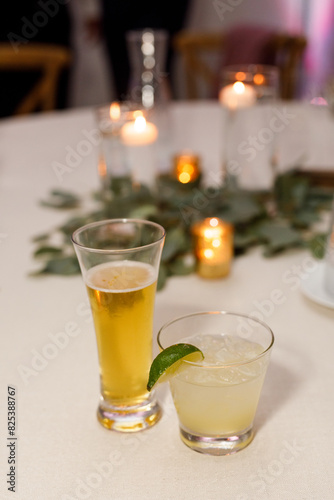 Beer and cocktail on table photo