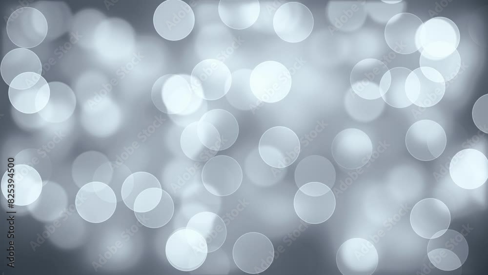 Silver Light Bokeh Background. Abstract Circles on a Blurry Soft Background. Looped video. Silver Light Bokeh Background. Abstract Circles on a Blurry Soft Background. Looped video.