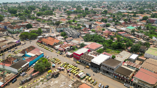 Seen from above a cluster of stopped taxis in the city of Sao Tome