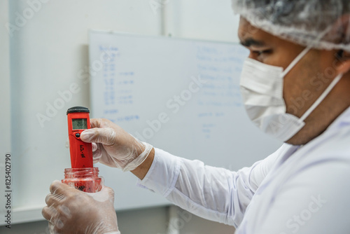 Scientist Measuring Ph at Laboratory